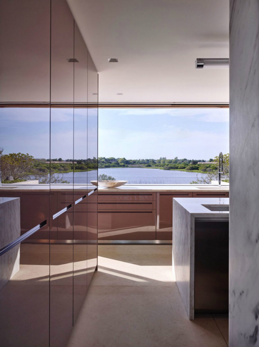 Kitchen is full of light and views