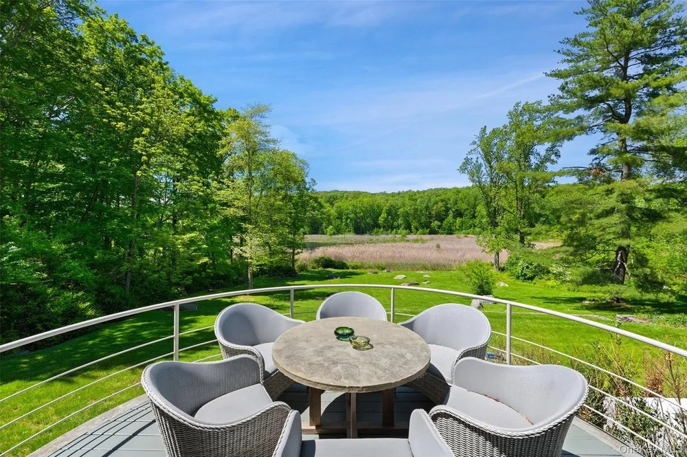 Outdoor table with ashtrays in a home in Upstate New York belonging to Pete Davidson