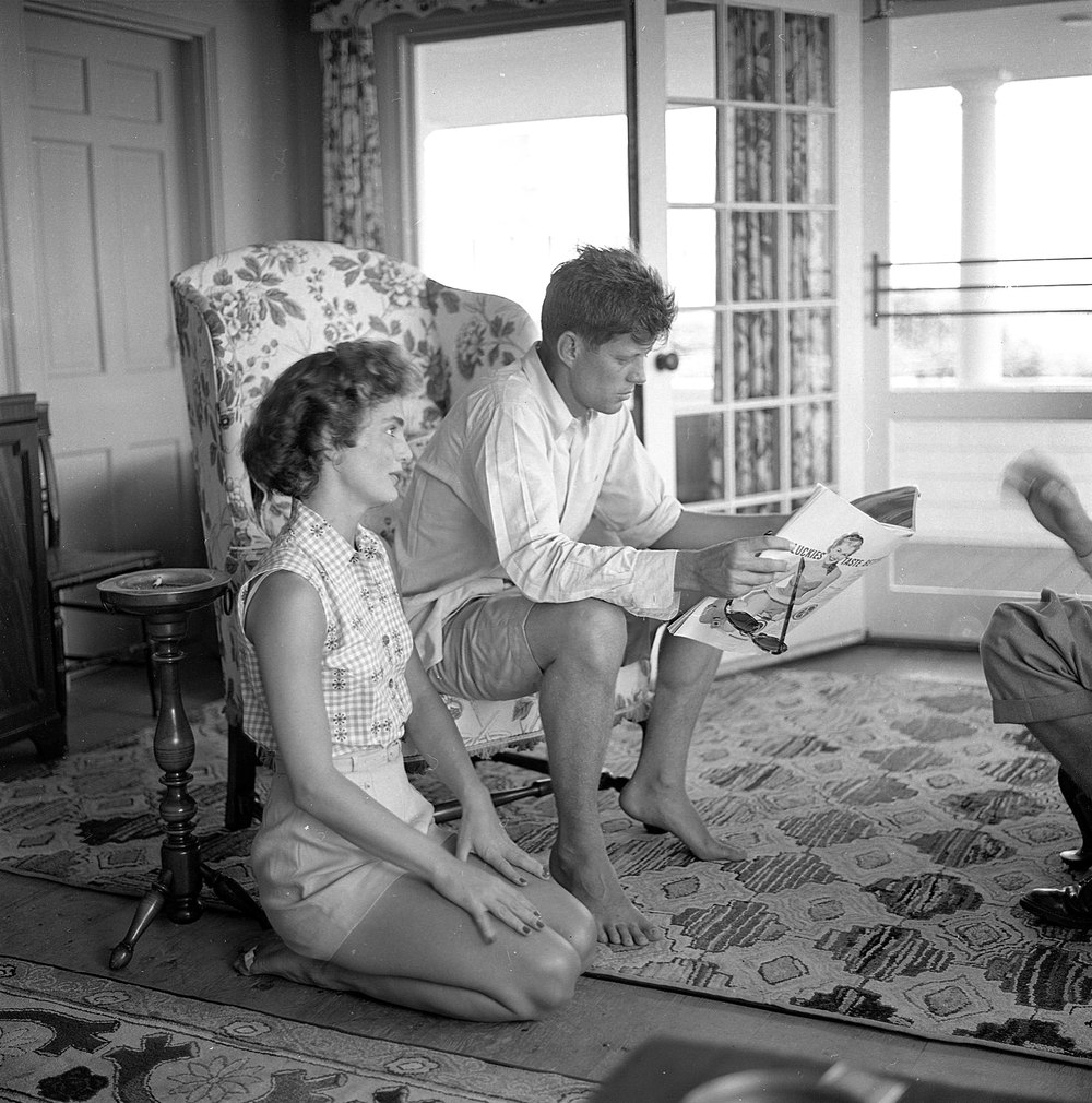 HYANNIS PORT, MA - JUNE 1953: Senator John F. Kennedy and fiance Jacqueline Bouvier are interviewed for a LIFE Magazine story while on vacation at the Kennedy compound in June 1953 in Hyannis Port, Massachusetts. (Photo by Hy Peskin/Getty Images)