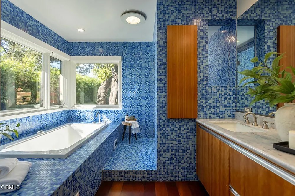 Spa Bathroom with Blue Mosaic Tile Surround and Soaking Tub